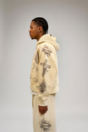 "Tatted Believer" Zip Up (Cream)